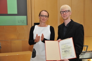 Preisverleihung durch Stadtr&auml;tin Mag.a Eva Schobesberger an Herrn Emberger