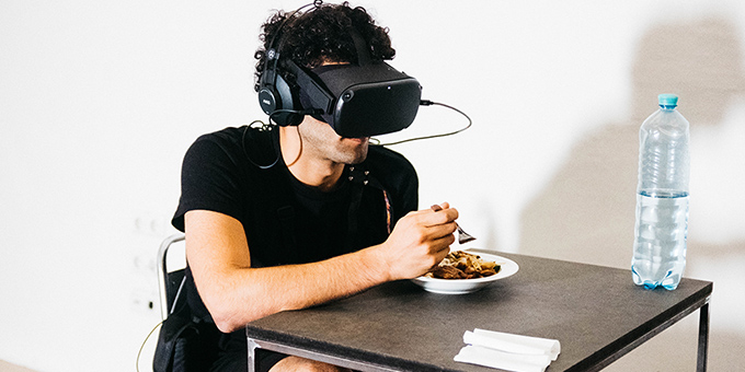 Photo: Milla Lewis Artist Mark Farid wearing a virtual reality headset