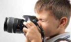 Kind mit Fotoapparat
